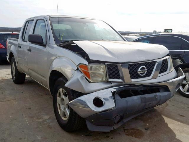 1N6AD07U25C405507 - 2005 NISSAN FRONTIER C SILVER photo 1