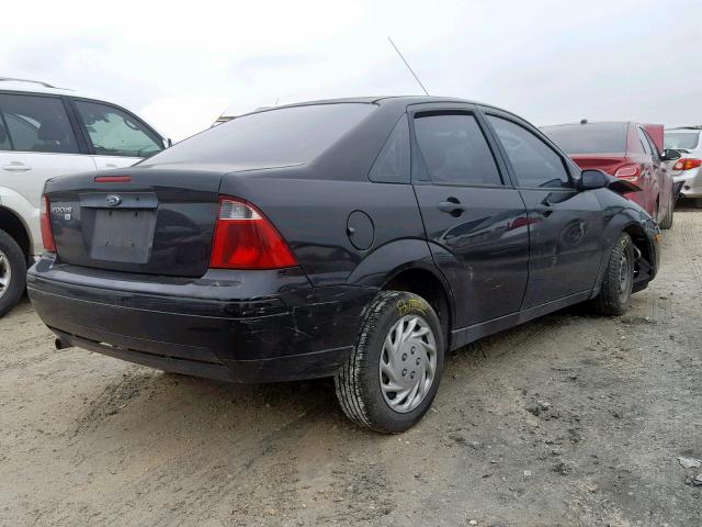 1FAFP34N67W111291 - 2007 FORD FOCUS ZX4 BLACK photo 4