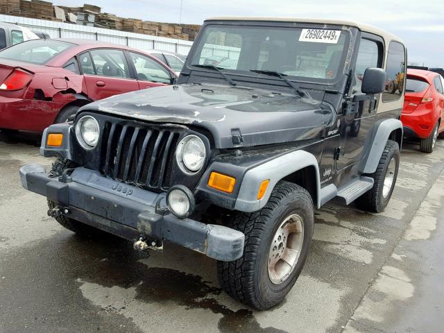 1J4FA49S34P749546 - 2004 JEEP WRANGLER / BLACK photo 2