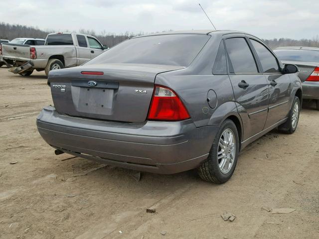 1FAFP34N76W234788 - 2006 FORD FOCUS ZX4 GRAY photo 4
