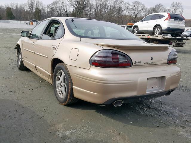 1G2WP52K42F199883 - 2002 PONTIAC GRAND PRIX GOLD photo 3