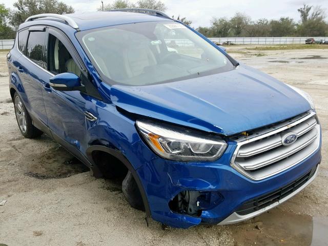 1FMCU0J90HUD04945 - 2017 FORD ESCAPE TIT BLUE photo 1