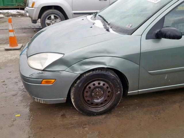 1FAFP34384W202945 - 2004 FORD FOCUS SE C GREEN photo 9