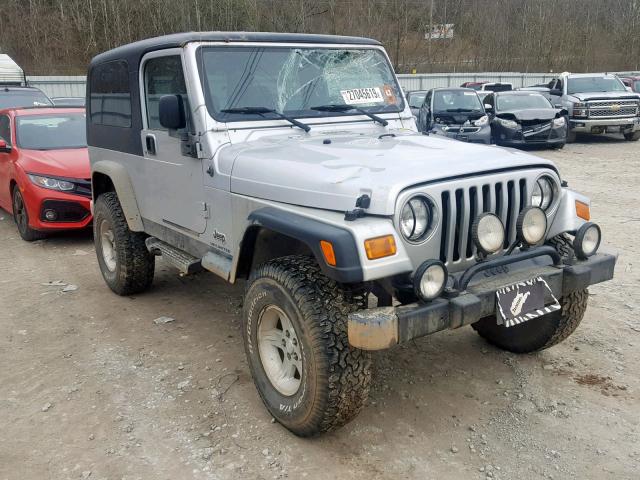 1J4FA49S44P759129 - 2004 JEEP WRANGLER / SILVER photo 1