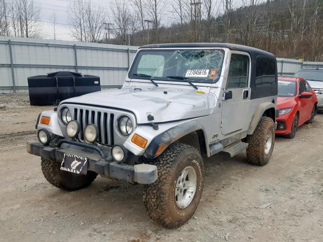 1J4FA49S44P759129 - 2004 JEEP WRANGLER / SILVER photo 2