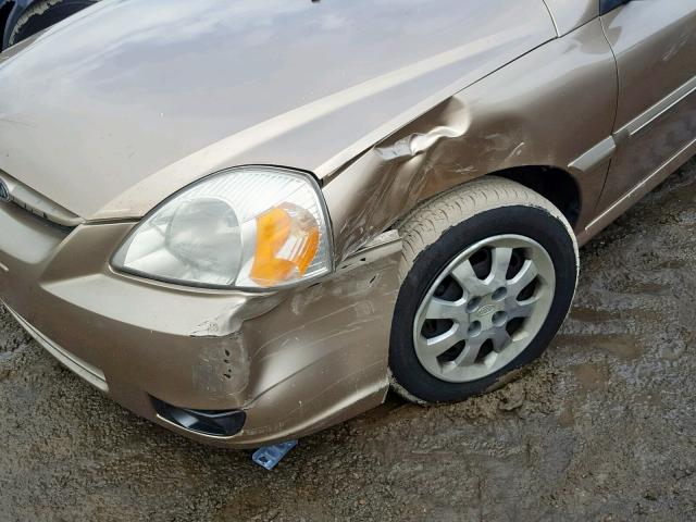 KNADC125536252378 - 2003 KIA RIO GOLD photo 9