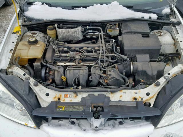 1FAFP34N15W233425 - 2005 FORD FOCUS ZX4 WHITE photo 7