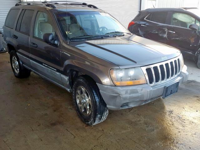 1J4GW58S9XC658306 - 1999 JEEP GRAND CHER GRAY photo 1