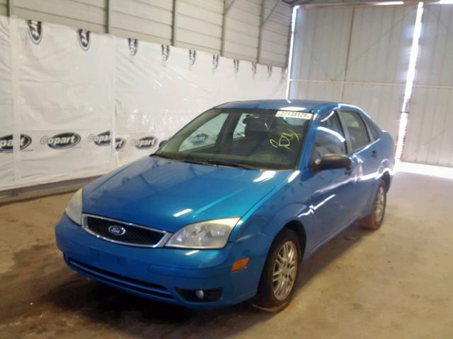 1FAHP34N27W242288 - 2007 FORD FOCUS ZX4 BLUE photo 2