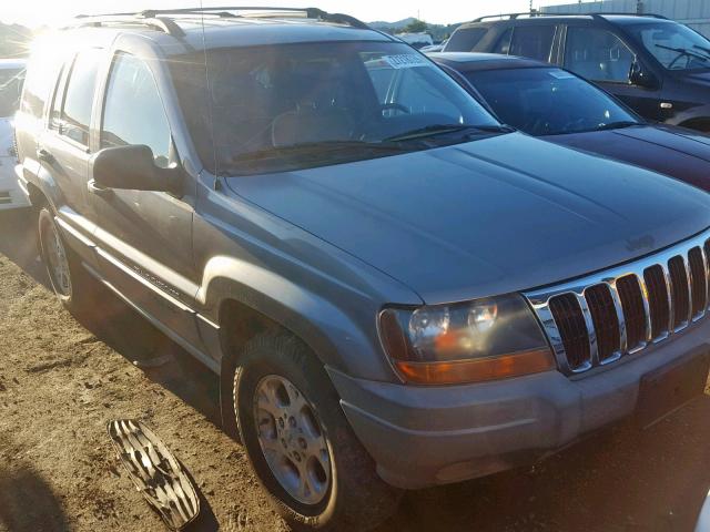 1J4GW58N3XC789578 - 1999 JEEP GRAND CHER GRAY photo 1