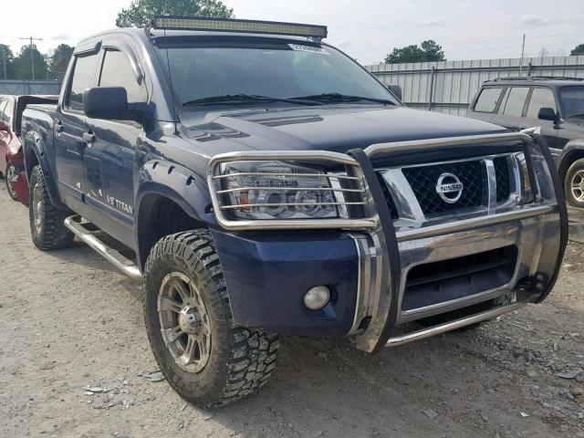 1N6BA0EC8CN319580 - 2012 NISSAN TITAN S BLUE photo 1