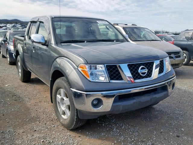 1N6AD07U06C430682 - 2006 NISSAN FRONTIER C GRAY photo 1