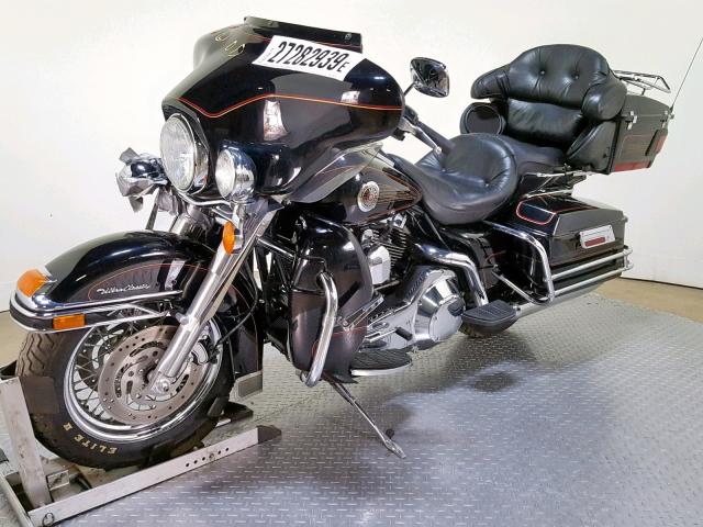 1HD1FCW152Y661482 - 2002 HARLEY-DAVIDSON FLHTCUI BLACK photo 4