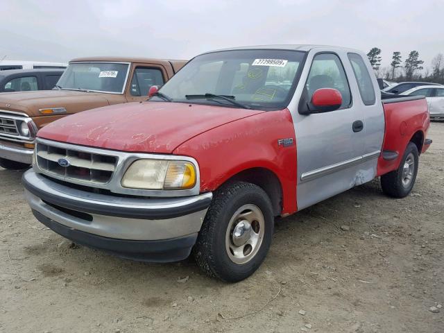 2FTRX17244CA85214 - 2004 FORD F-150 HERI SILVER photo 2