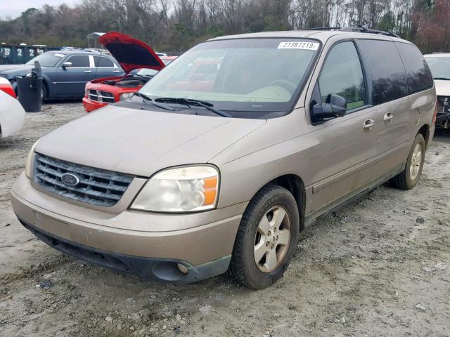 2FMZA57654BB21621 - 2004 FORD FREESTAR S GOLD photo 2