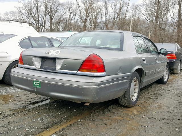 2FAFP74W31X150545 - 2001 FORD CROWN VICT GRAY photo 4