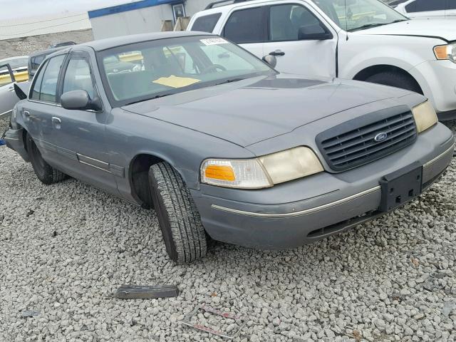 2FAFP71W2XX126802 - 1999 FORD CROWN VICT GRAY photo 1