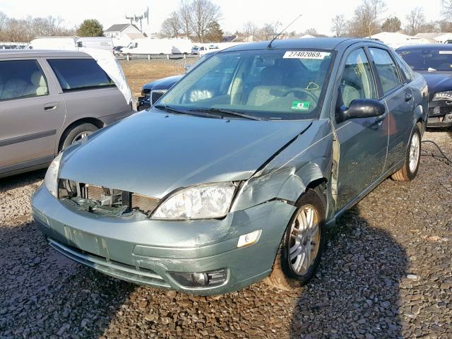 1FAFP34N55W204025 - 2005 FORD FOCUS ZX4 TEAL photo 2