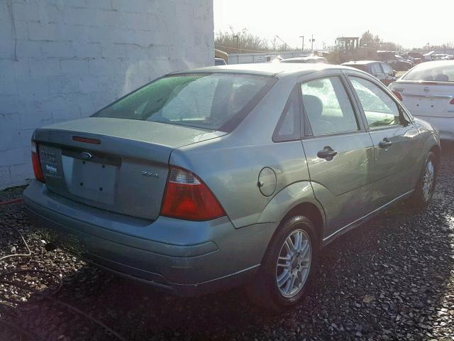 1FAFP34N55W204025 - 2005 FORD FOCUS ZX4 TEAL photo 4