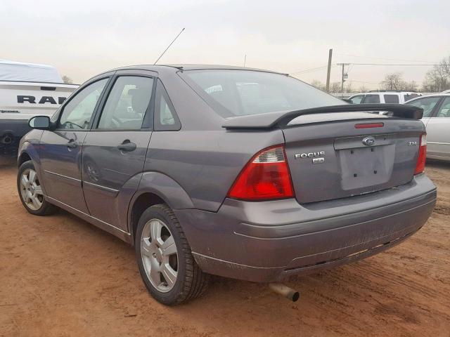 1FAHP34N36W244937 - 2006 FORD FOCUS ZX4 GRAY photo 3