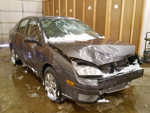 1FAFP34N77W127337 - 2007 FORD FOCUS ZX4 GRAY photo 1