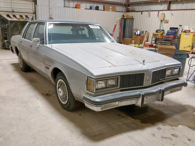 1G3AY69Y3EM708283 - 1984 OLDSMOBILE DELTA 88 R GRAY photo 1