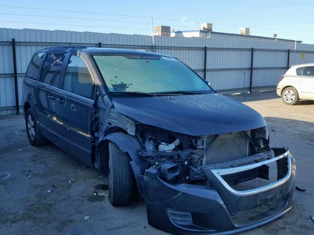 2V4RW3DG4BR740230 - 2011 VOLKSWAGEN ROUTAN SE BLACK photo 1