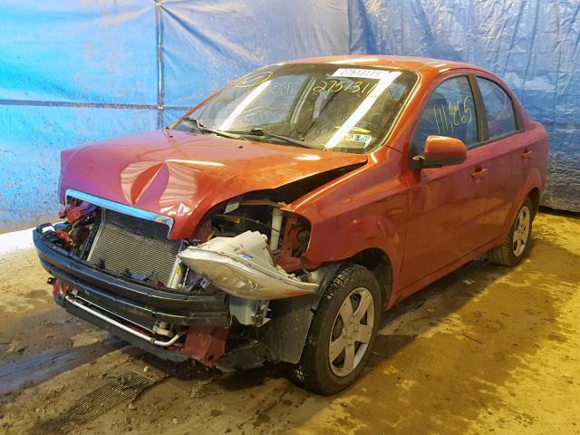 KL1TD5DE4BB183146 - 2011 CHEVROLET AVEO LS RED photo 2
