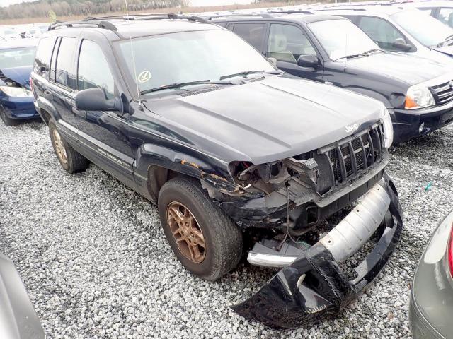 1J4GW48N34C125223 - 2004 JEEP GRAND CHER BLACK photo 1