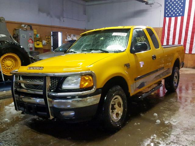 2FTRX18W24CA50706 - 2004 FORD F-150 HERI YELLOW photo 2