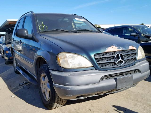 4JGAB54E4XA077469 - 1999 MERCEDES-BENZ ML 320 GREEN photo 1