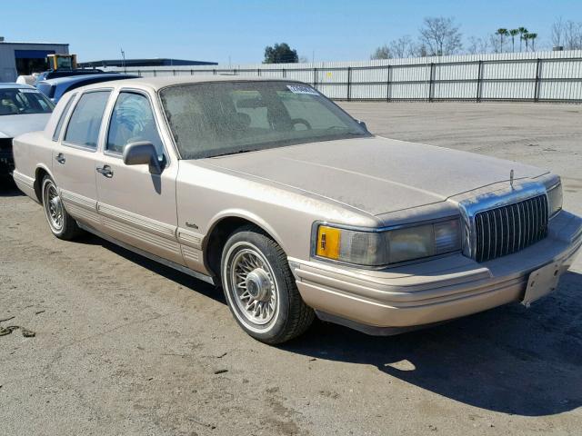 1LNLM81W1VY611128 - 1997 LINCOLN TOWN CAR GOLD photo 1