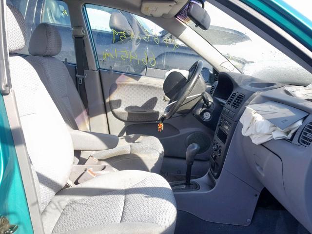 KNADC123416058050 - 2001 KIA RIO GREEN photo 5