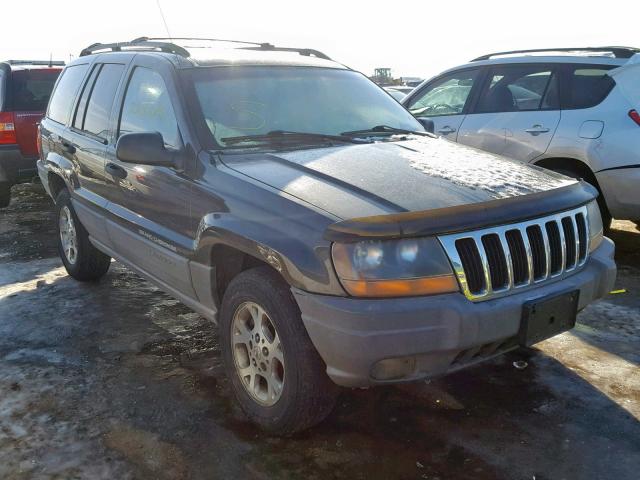 1J4GW58S6XC769766 - 1999 JEEP GRAND CHER GRAY photo 1