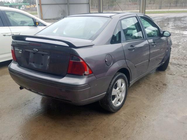 1FAFP34N27W255551 - 2007 FORD FOCUS ZX4 GRAY photo 4