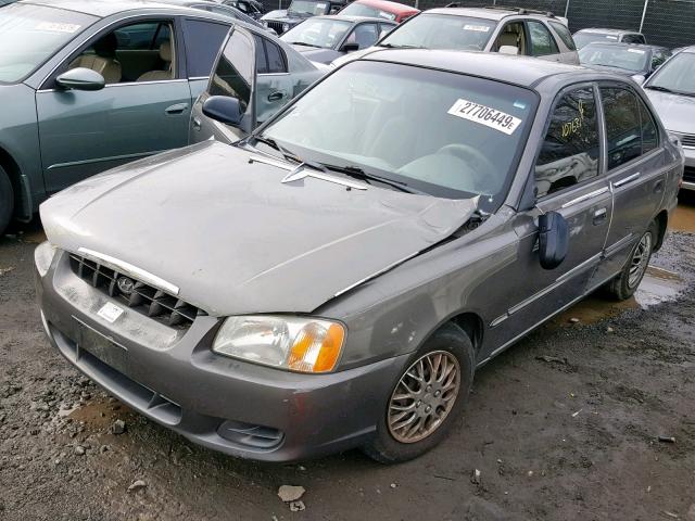 KMHCG45C71U161678 - 2001 HYUNDAI ACCENT GL TAN photo 2