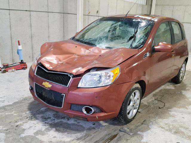 KL1TG6DE8BB237657 - 2011 CHEVROLET AVEO LT ORANGE photo 2