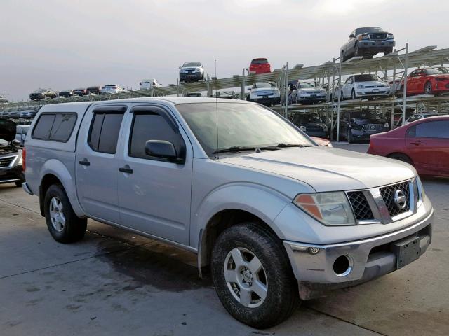 1N6AD07WX6C460077 - 2006 NISSAN FRONTIER C SILVER photo 1