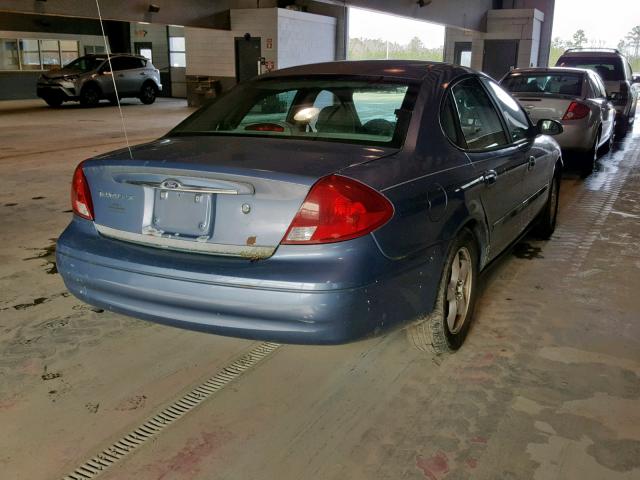 1FAFP55U7YG112947 - 2000 FORD TAURUS SES BLUE photo 4