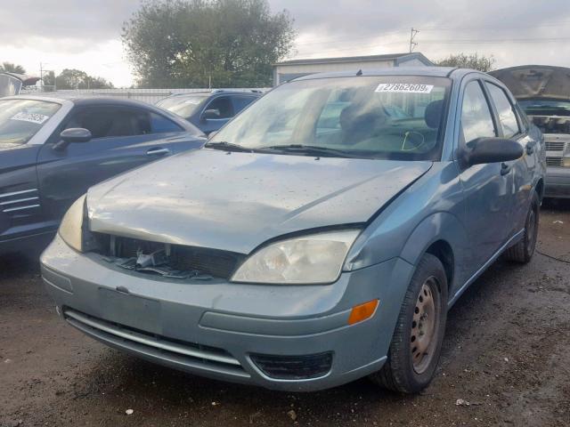 1FAFP34NX5W312995 - 2005 FORD FOCUS ZX4 GREEN photo 2