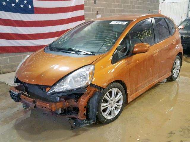 JHMGE8H47AS010938 - 2010 HONDA FIT SPORT ORANGE photo 2