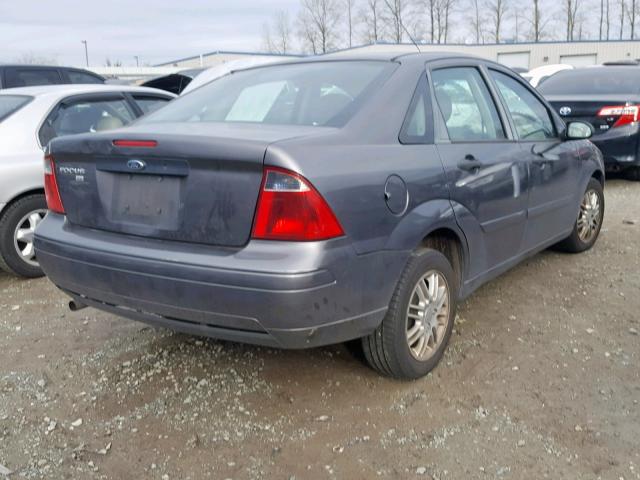 1FAFP34N97W254929 - 2007 FORD FOCUS ZX4 GRAY photo 4