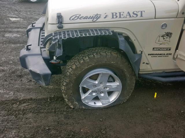 1C4HJWDG8HL734924 - 2017 JEEP WRANGLER U TAN photo 9