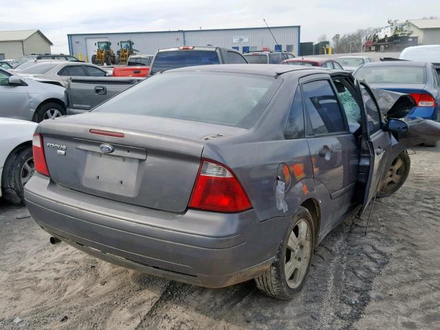 1FAFP34NX7W118082 - 2007 FORD FOCUS ZX4 GRAY photo 4