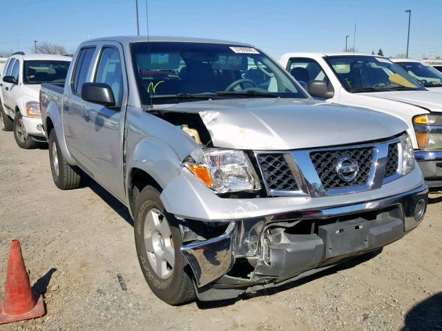 1N6AD07U67C423642 - 2007 NISSAN FRONTIER C SILVER photo 1