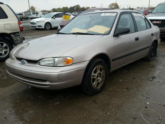 1Y1SK54802Z414552 - 2002 CHEVROLET GEO PRIZM TAN photo 2