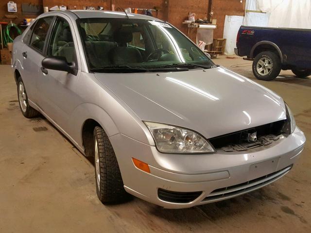 1FAHP34N77W157981 - 2007 FORD FOCUS ZX4 SILVER photo 1