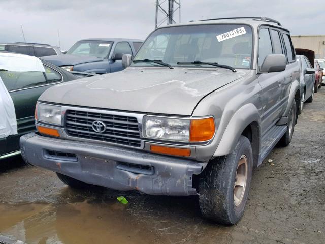 JT3HJ85J0V0169706 - 1997 TOYOTA LAND CRUIS BEIGE photo 2