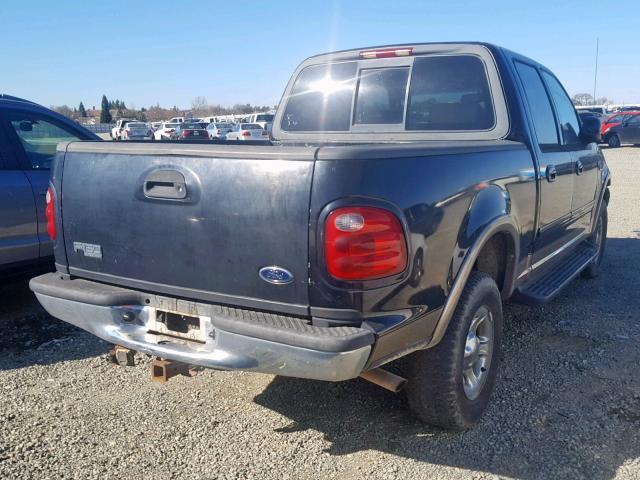 1FTRW08L31KA24917 - 2001 FORD F150 SUPER BLACK photo 4