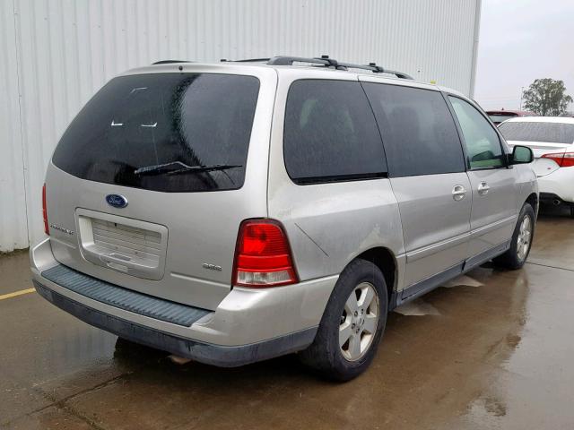 2FMZA57684BA45490 - 2004 FORD FREESTAR S SILVER photo 4